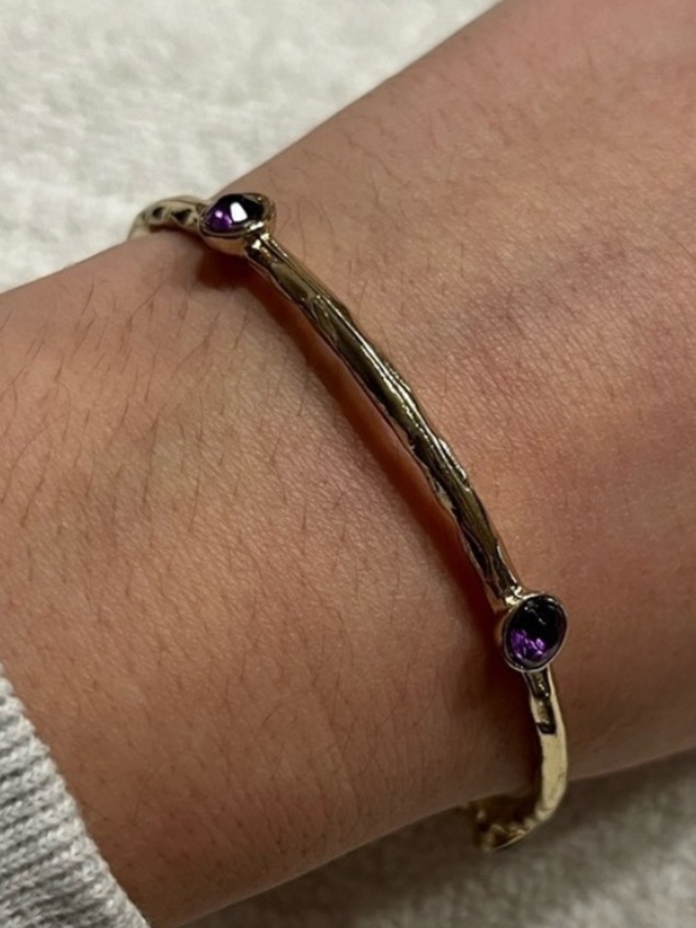 Gold tone bangle bracelet. Purple accents. Layer! Simple.